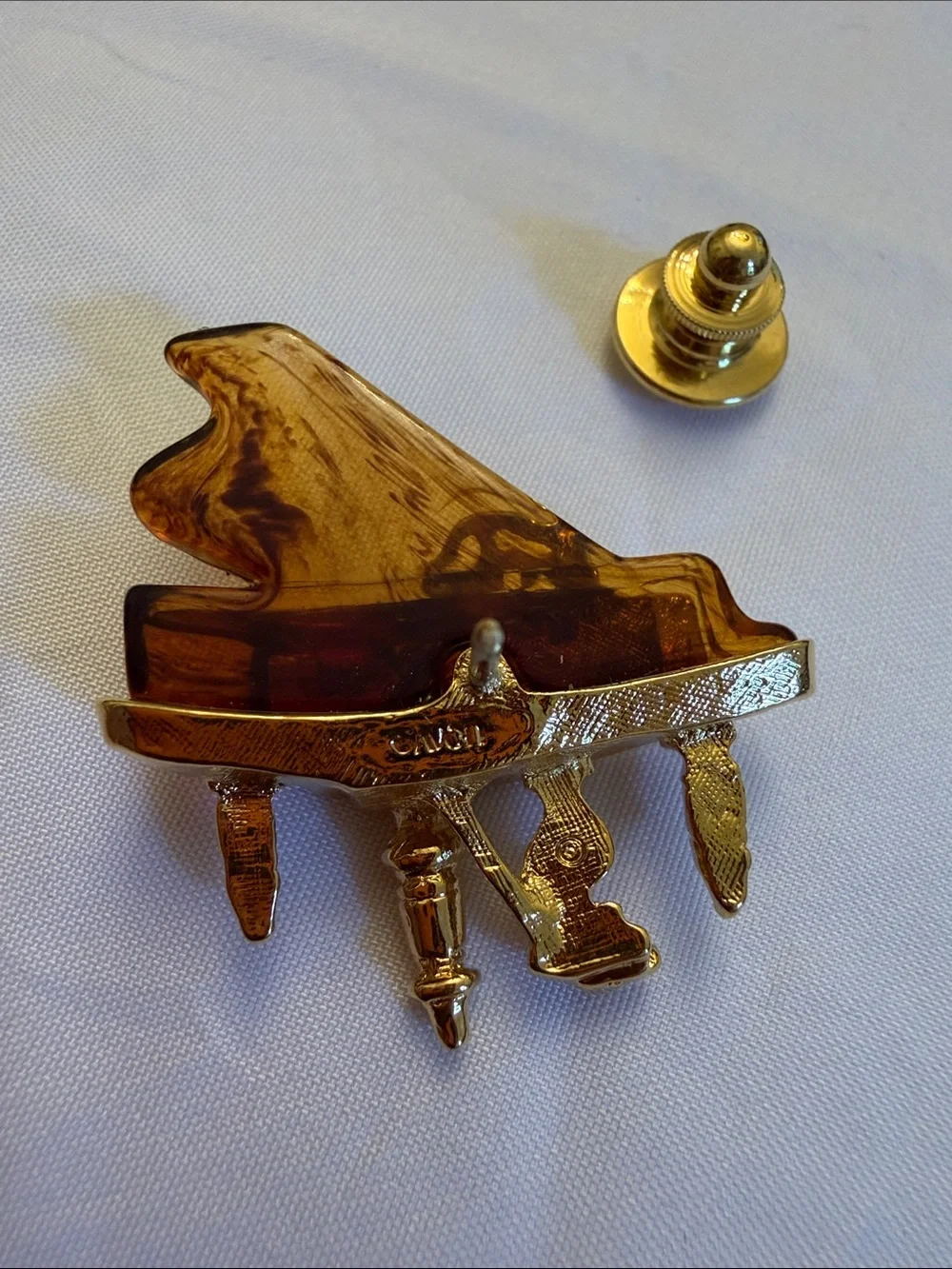 Vintage Avon Gold-Tone & Amber Piano Brooch